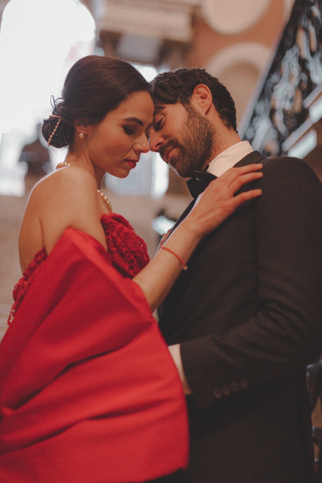 couple embrace on staircase