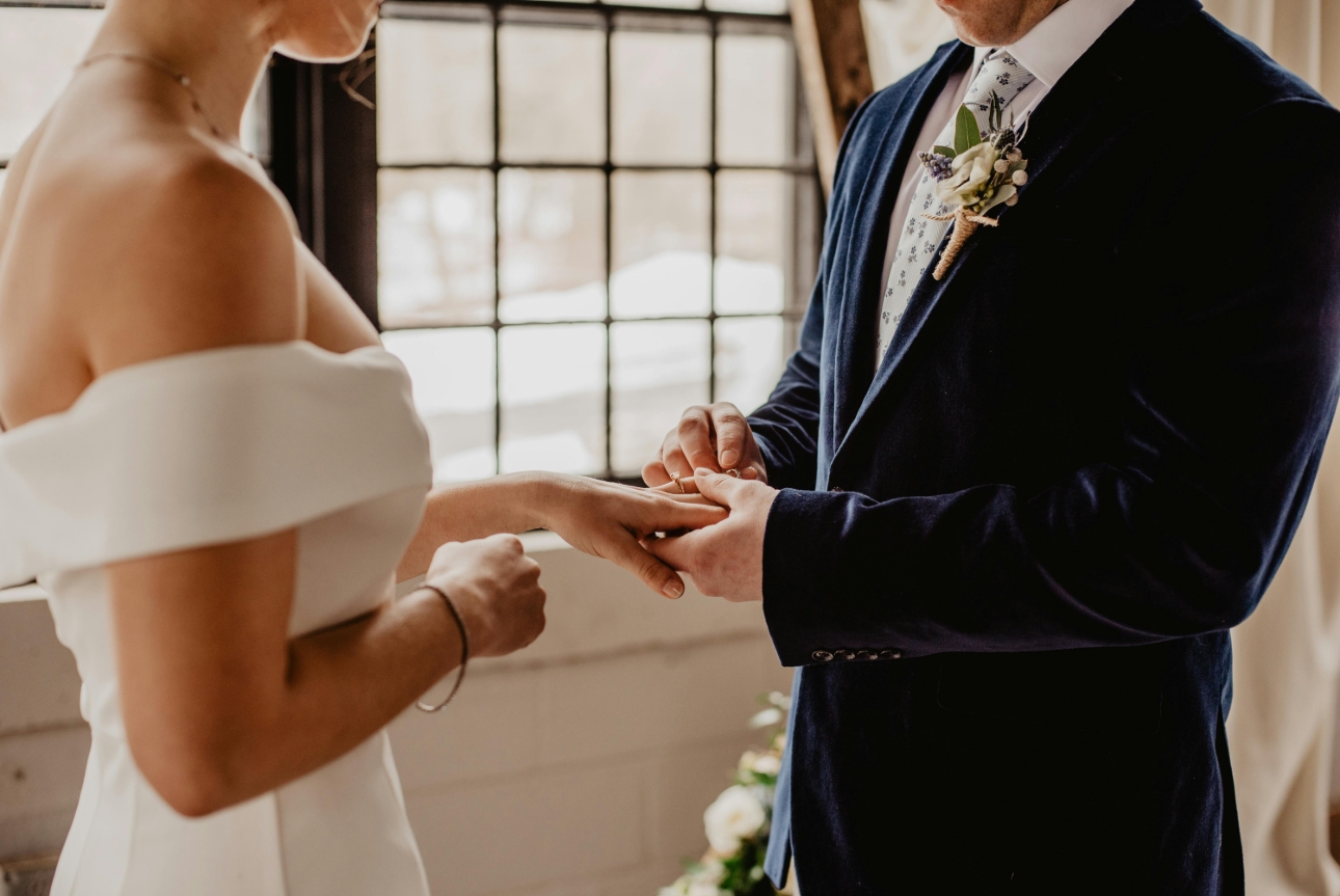 bride and groom exchanging 