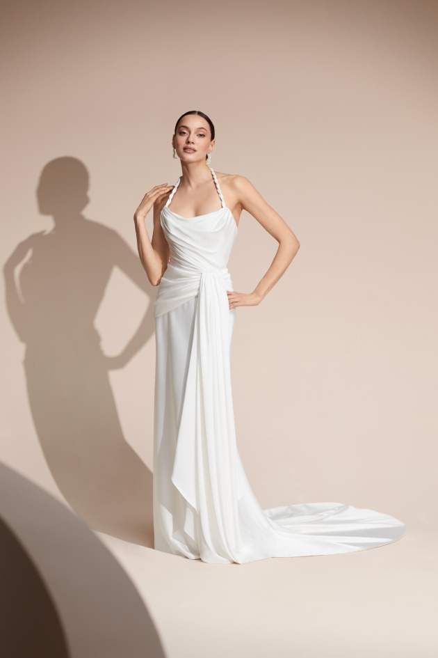 structure of a corseted bodice with the fluidity of satin dress